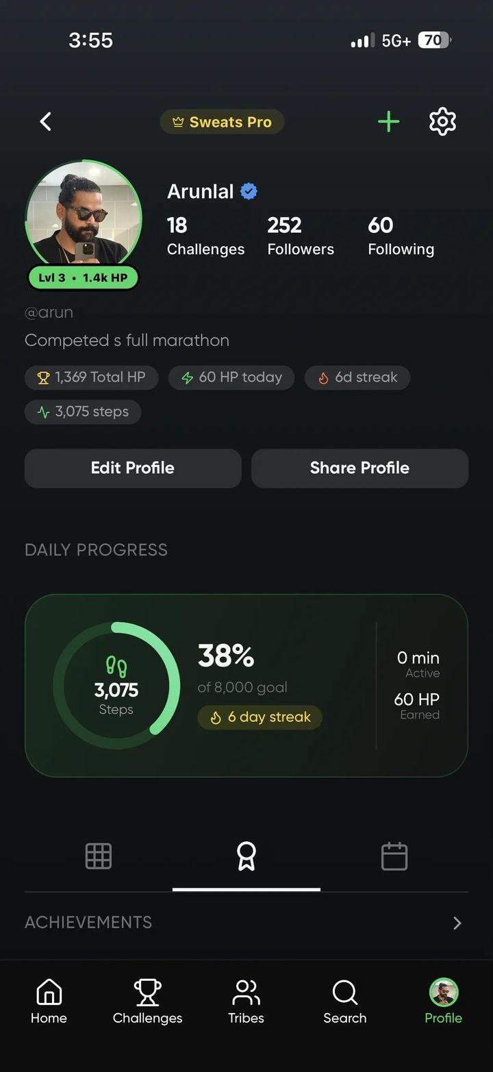 Sweats fitness app profile screen with level, health points, workout streak, and a daily step progress ring